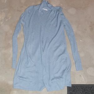 Never worn light blue long ribbed sweater, size medium